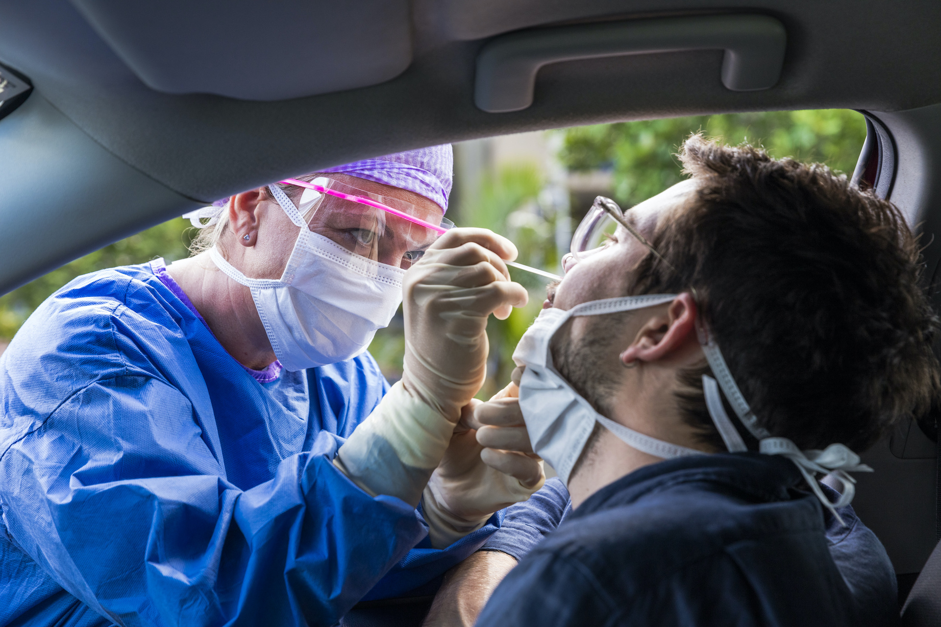 Doctor taking a nasal swab test